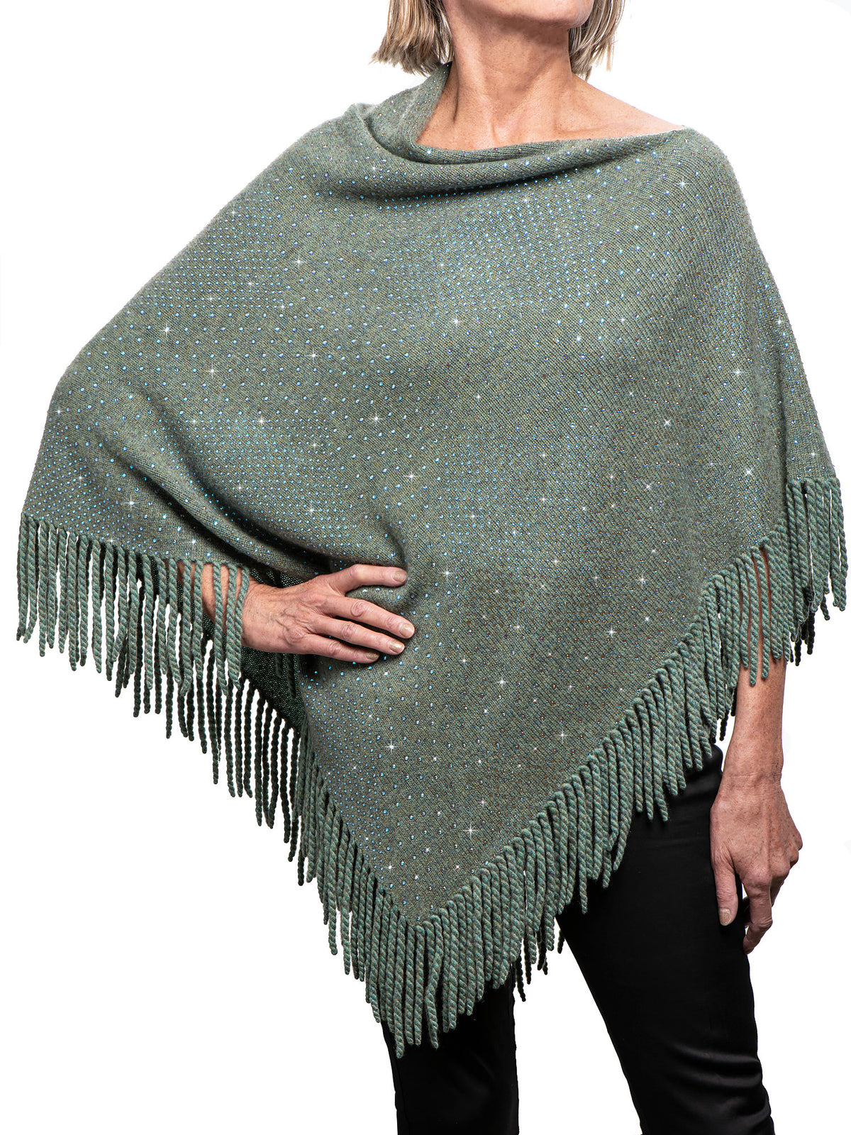 Model wearing Sage Green Cashmere Crystal Poncho with thousands of Swarovski crystals.